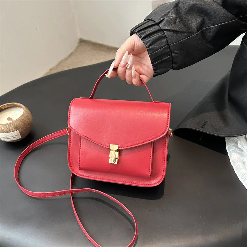 PU leather messenger bag in horizontal square shape with crossbody strap