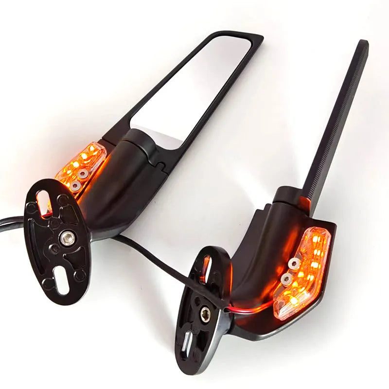 Pair of yellow motorcycle rearview mirrors with convex glass lenses and integrated LED running lights.