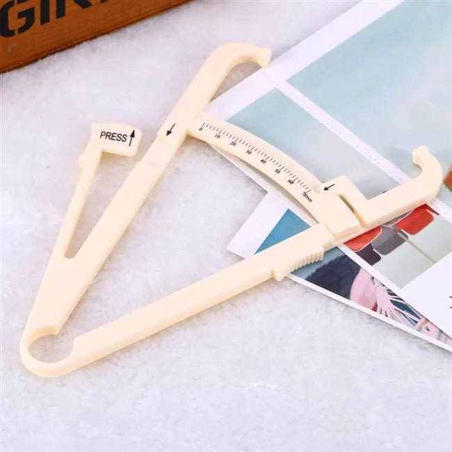 Acrylic fat caliper body fat measuring instrument showing measurement scales and 200mm range