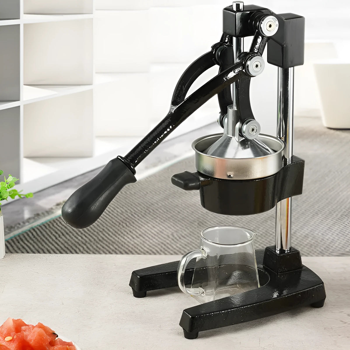 40cm tall black cast iron manual citrus juicer with stainless steel funnel