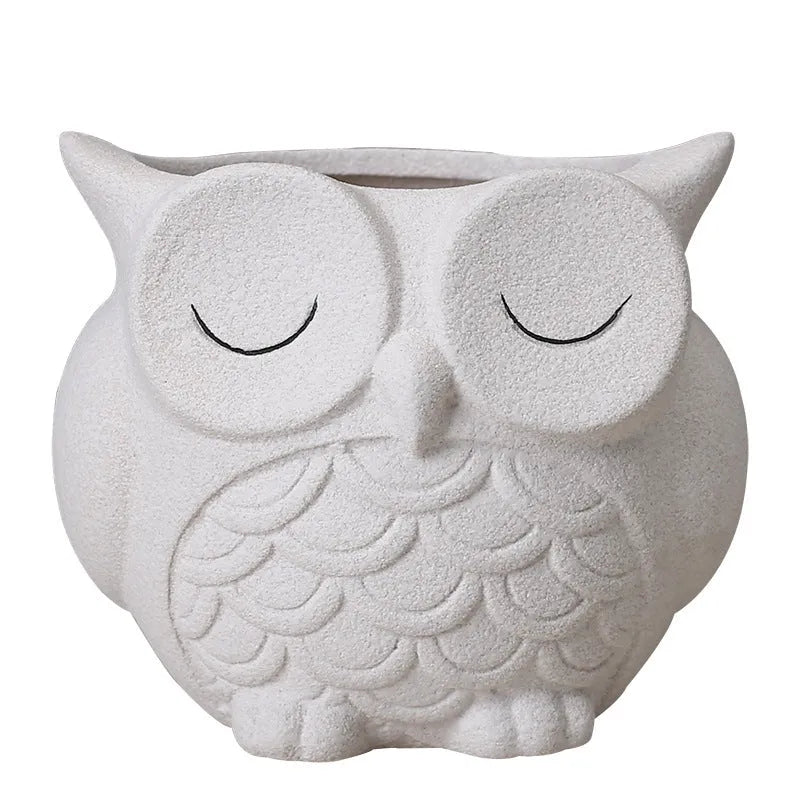 Handmade frosted ceramic owl succulent pot in light pink, white, green, or blue.