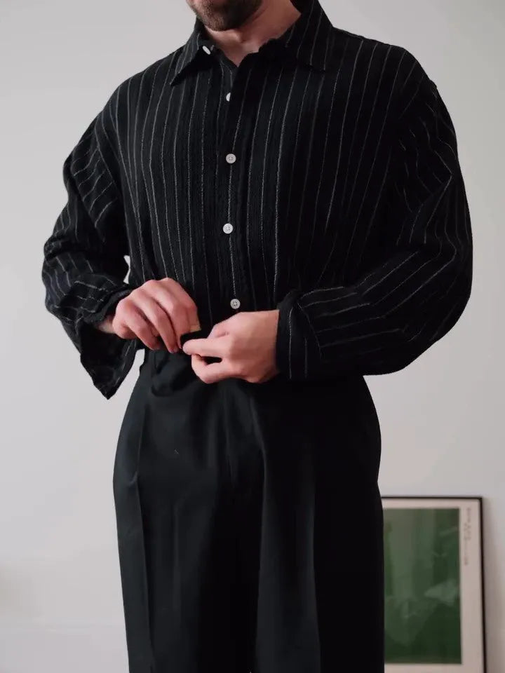 Men's black pinstriped button-down shirt with regular fit and striped design