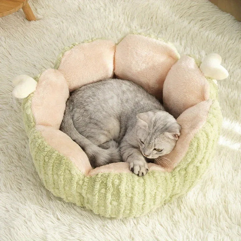 Green cactus print soft cat litter mat for pets next to a litter tray.