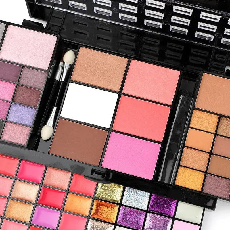 74 colour makeup palette set with four powder plates, a mirror, and included eyeshadow stick, contour brush, and lip brush
