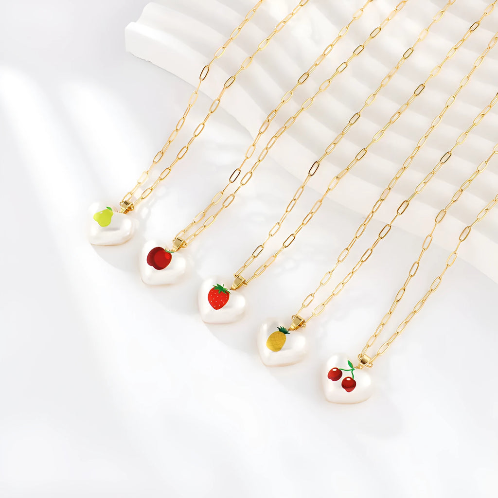 Geometric heart necklace with fruit pendant on adjustable chain in apple cherry pear pineapple strawberry designs