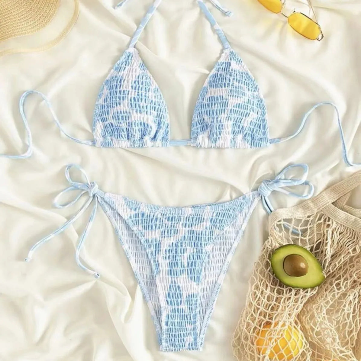 Women's halter neck swimsuit set with floral briefs in light blue colour