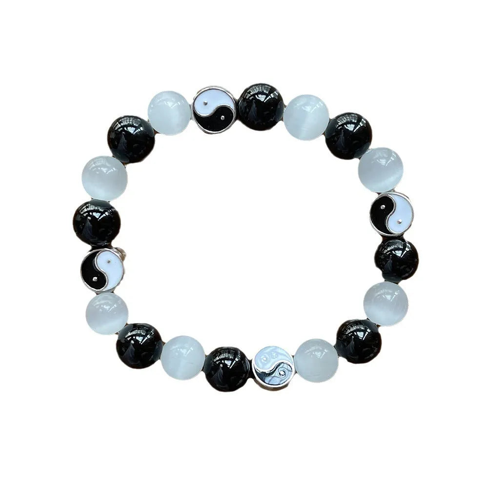 Natural stone Tai Chi bracelet with 10mm opal and black agate beads in traditional Chinese design