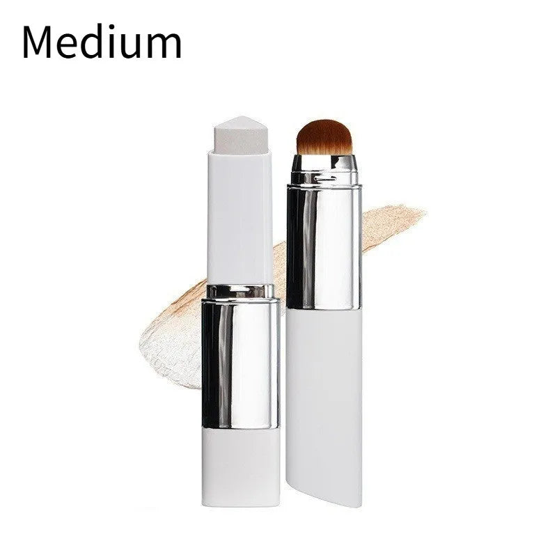 Blanc Cover cream stick foundation brush with a silver aluminium handle and a removable brush head.