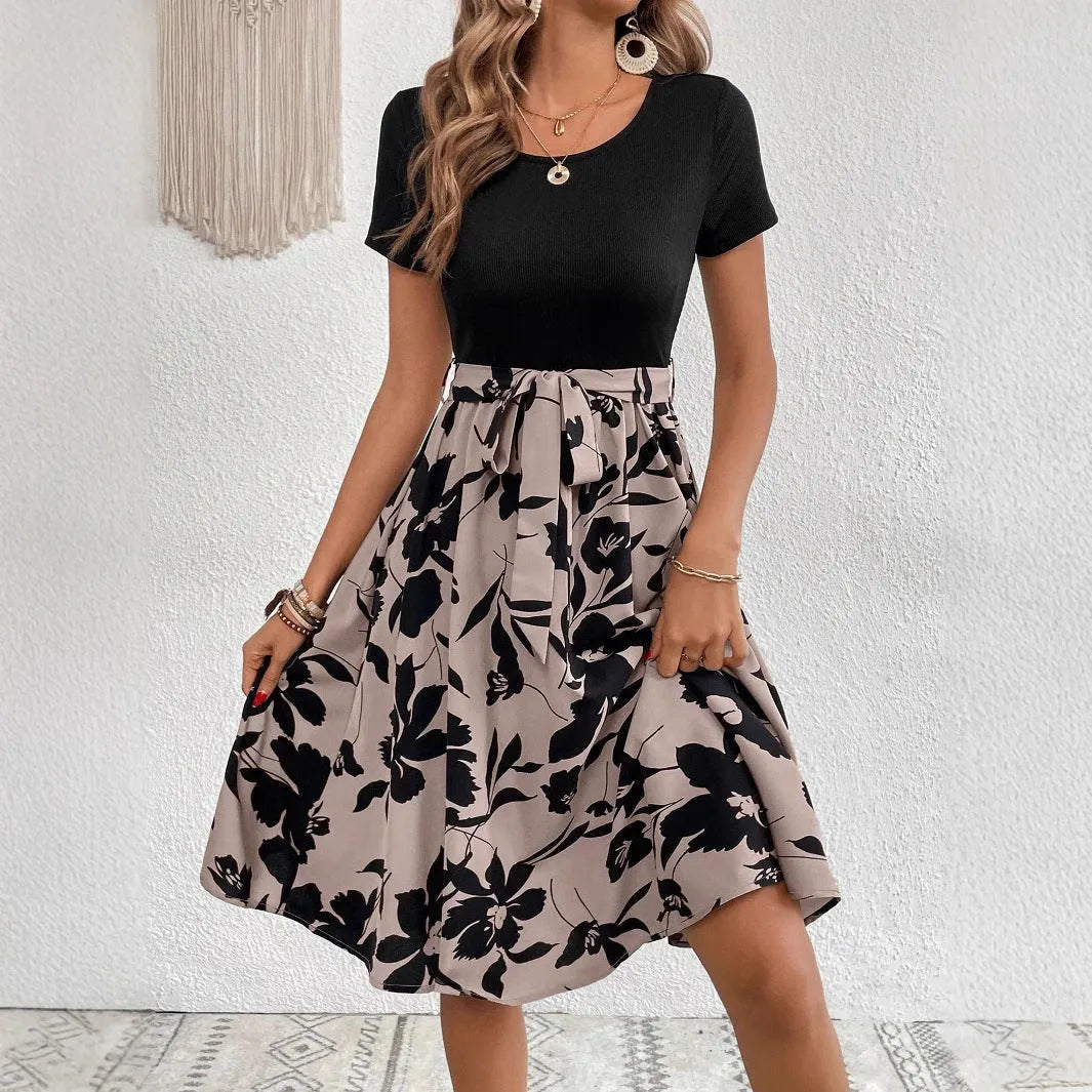 Women's khaki casual dress with lace-up front and floral printing, featuring A-line skirt and shoulder strap details