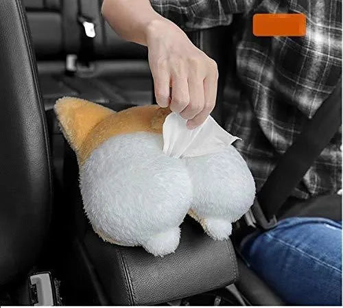 Yellow corgi butt shaped car tissue box cover hanging from a sun visor