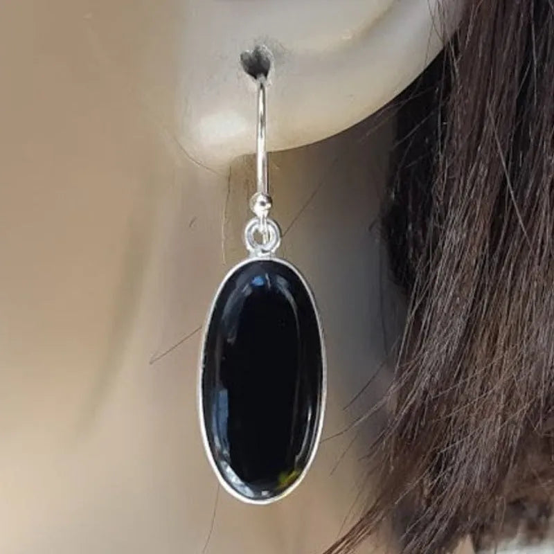 Women's black agate oval pendant earrings with geometric Chinese style framework and 925 silver electroplated finish