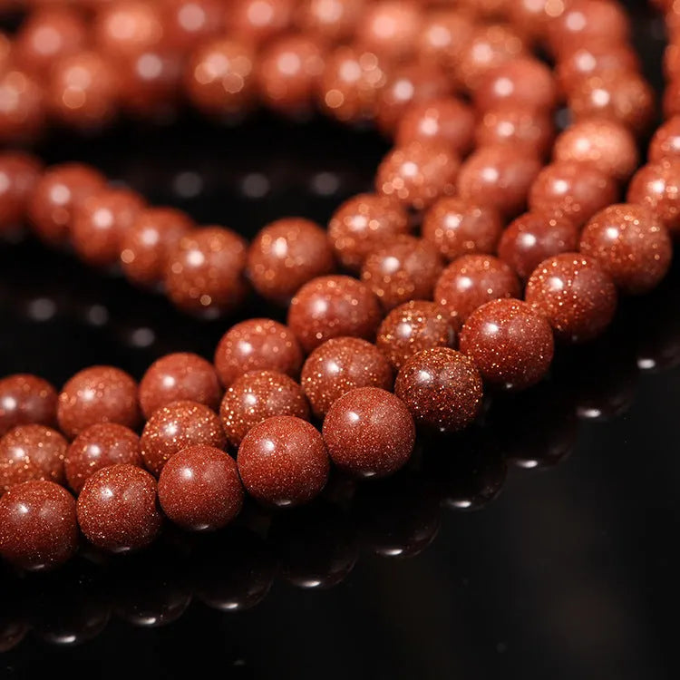 Golden star stone mantra bracelet with 108 sand beads and fu character ornament