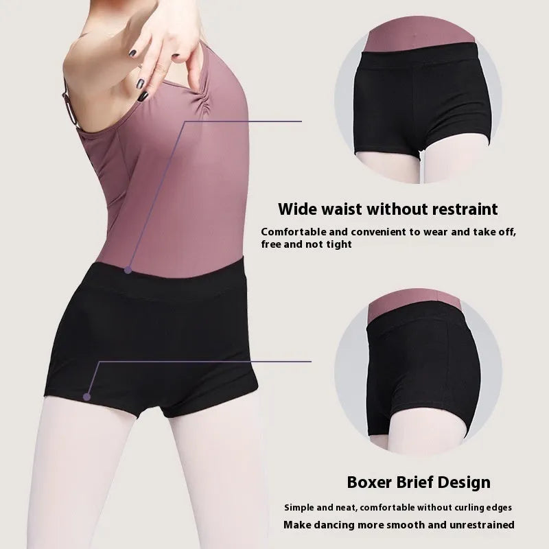 Black cotton women's dance practice shorts laid flat, shown in a solid colour.