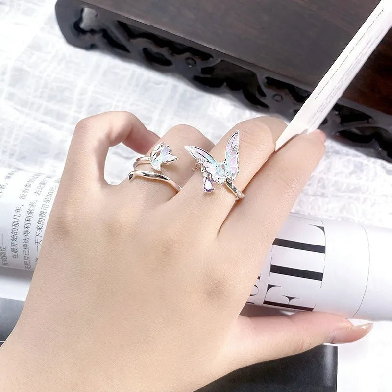 Adjustable copper insect ring with dripped oil finish in an irregular, artisanal design.