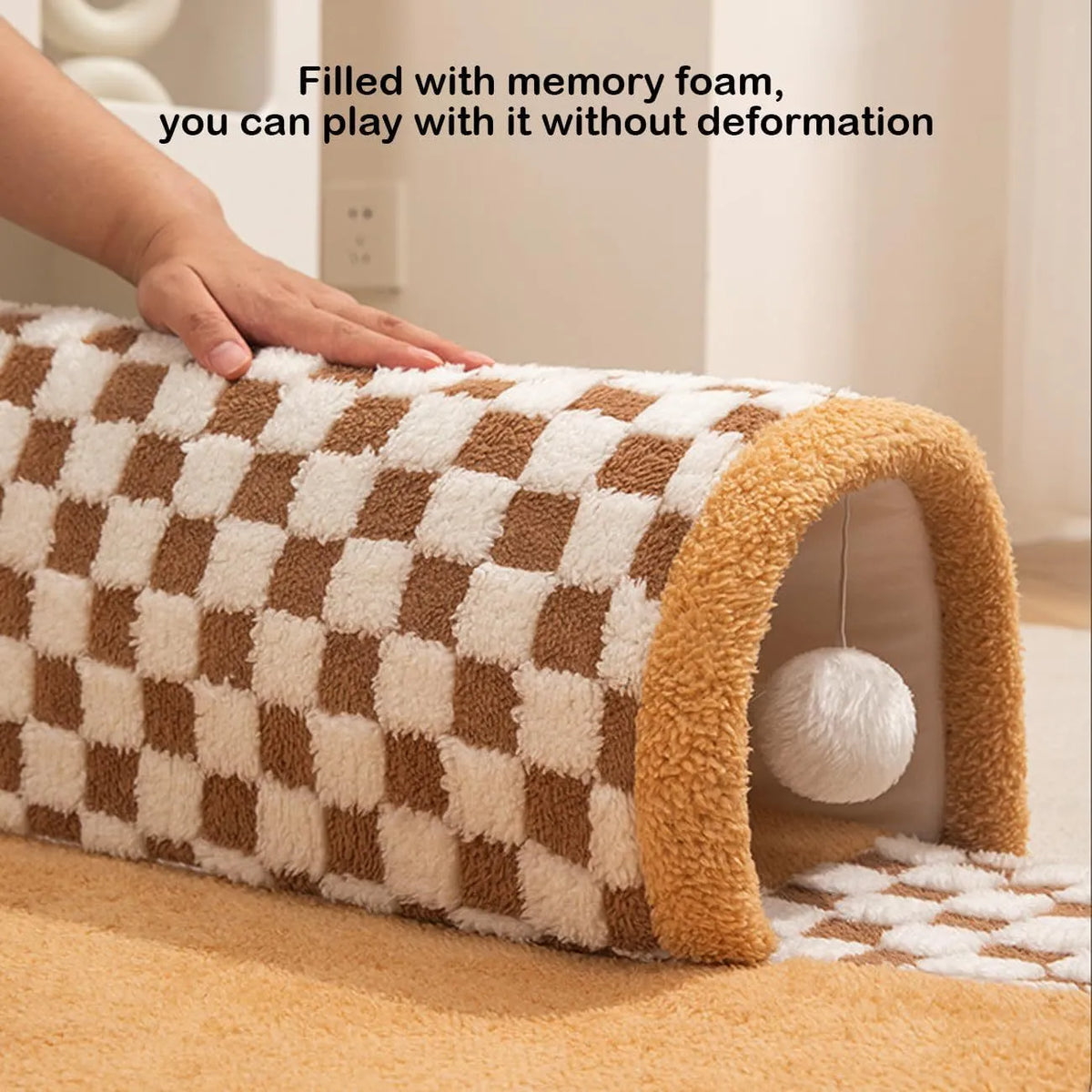 Coffee coloured fan-shaped plush pet bed with a tunnel entrance and anti-slip granular base.