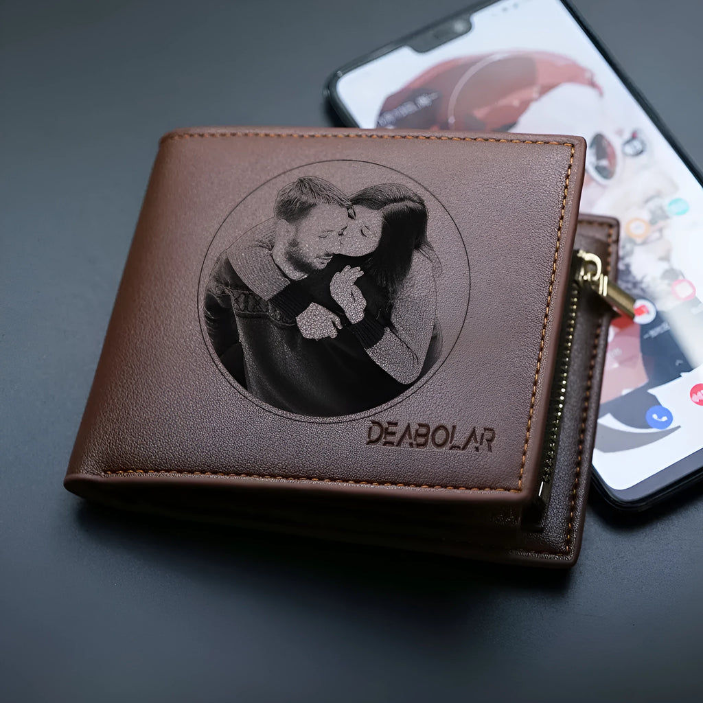 Brown leather men's wallet with a silver zipper closure laid flat.