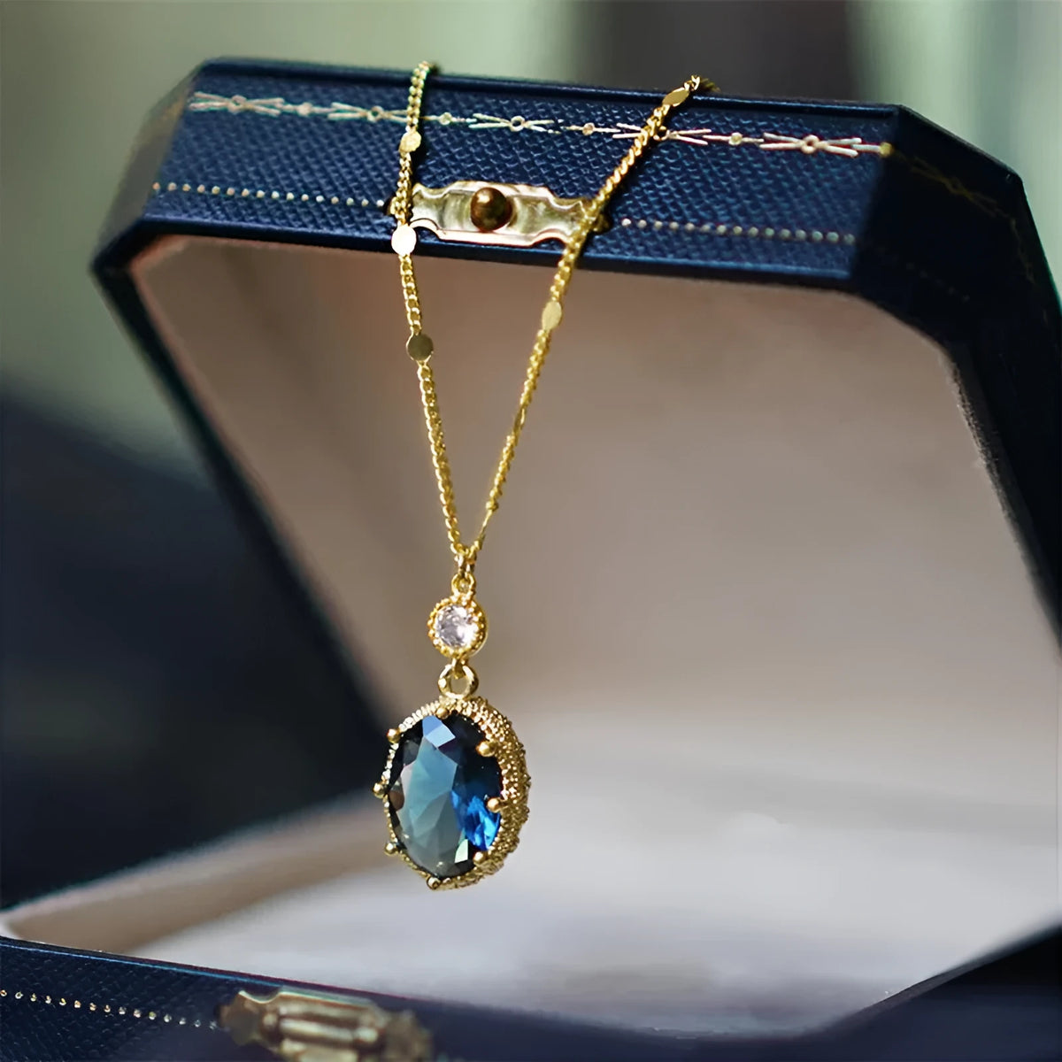 Copper geometric pendant necklace with electroplated gold finish