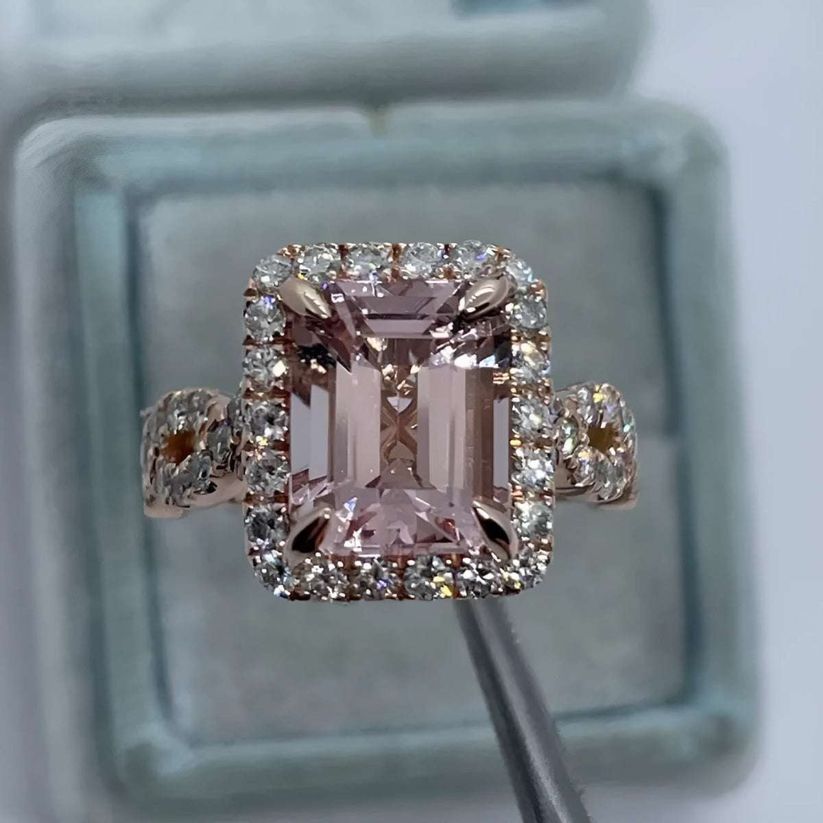 Geometric rose gold electroplated alloy ring shown in structured design