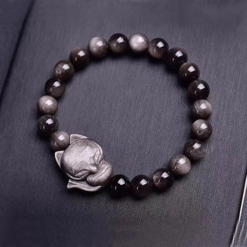Obsidian fox single ring bracelet showing polished 8mm stone bead with detailed fox pendant on adjustable band