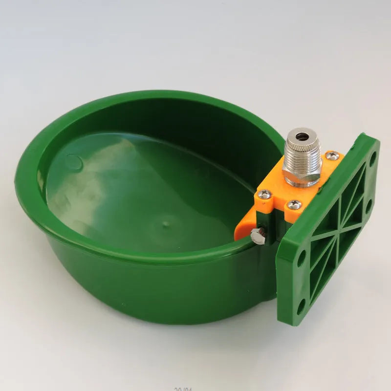 Green plastic drinking bowl for sheep livestock on farms