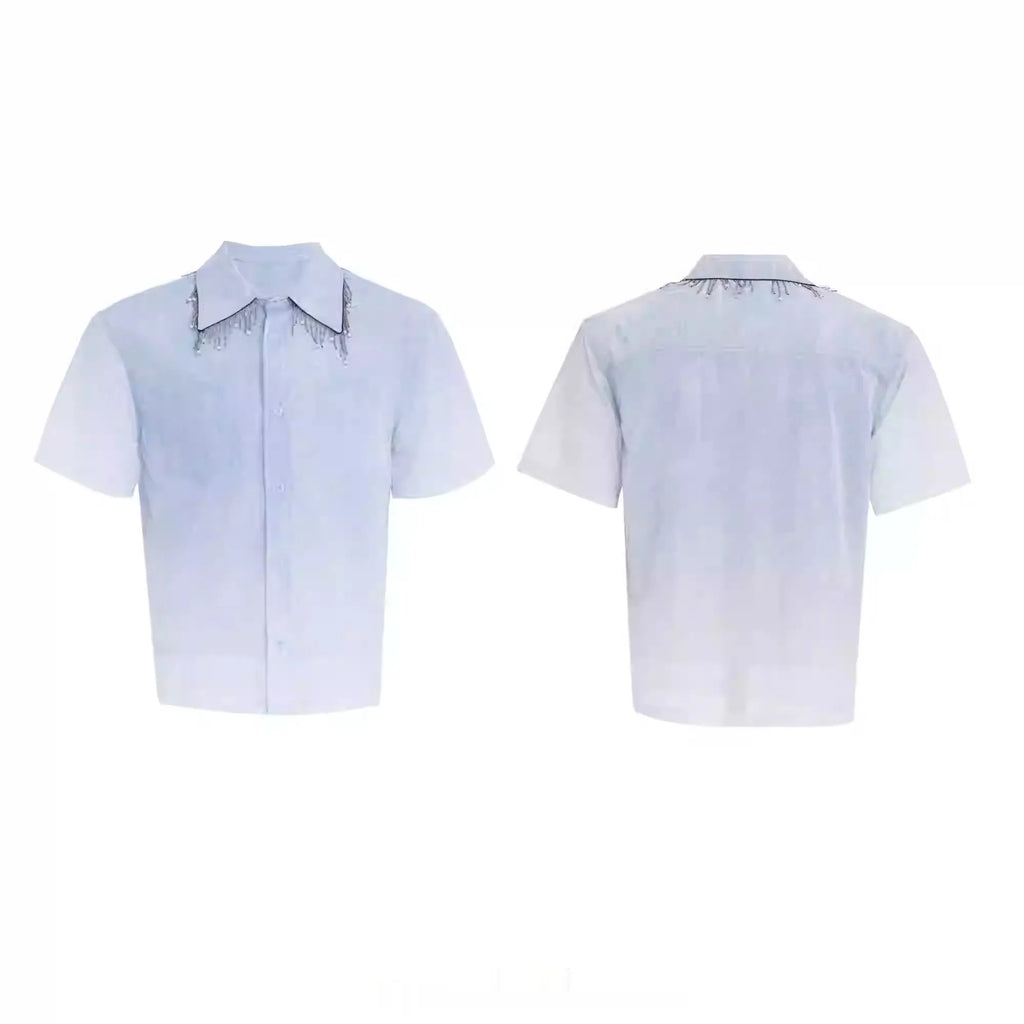 A loose-fitting men's blue to white gradient short-sleeve shirt for casual summer wear.