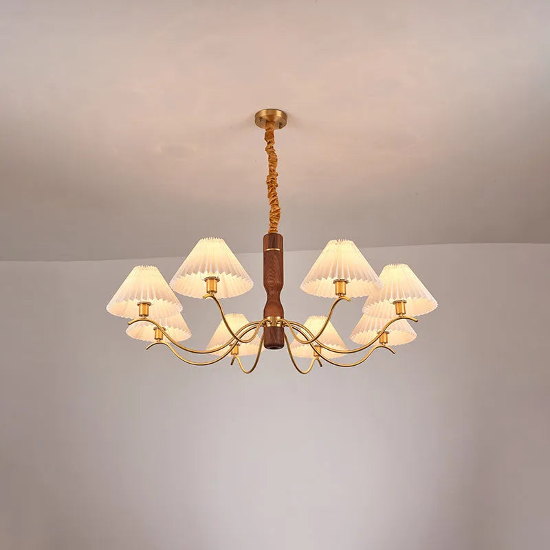 Walnut wood and copper American retro wall lamp with fabric shade on a wall.