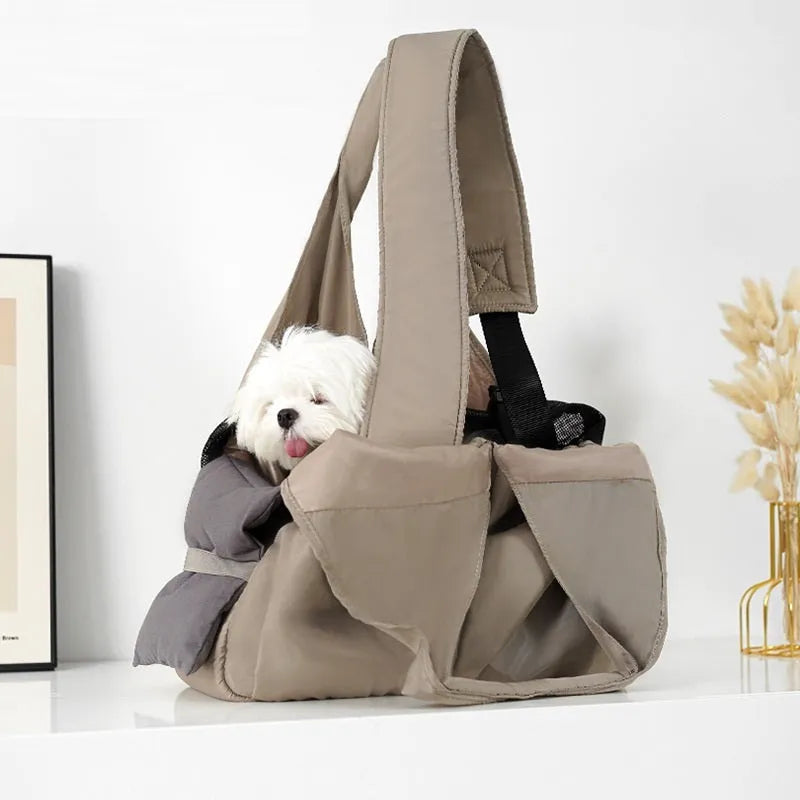 Apricot coloured cloth pet handbag carrier with shoulder strap for small dogs or cats.