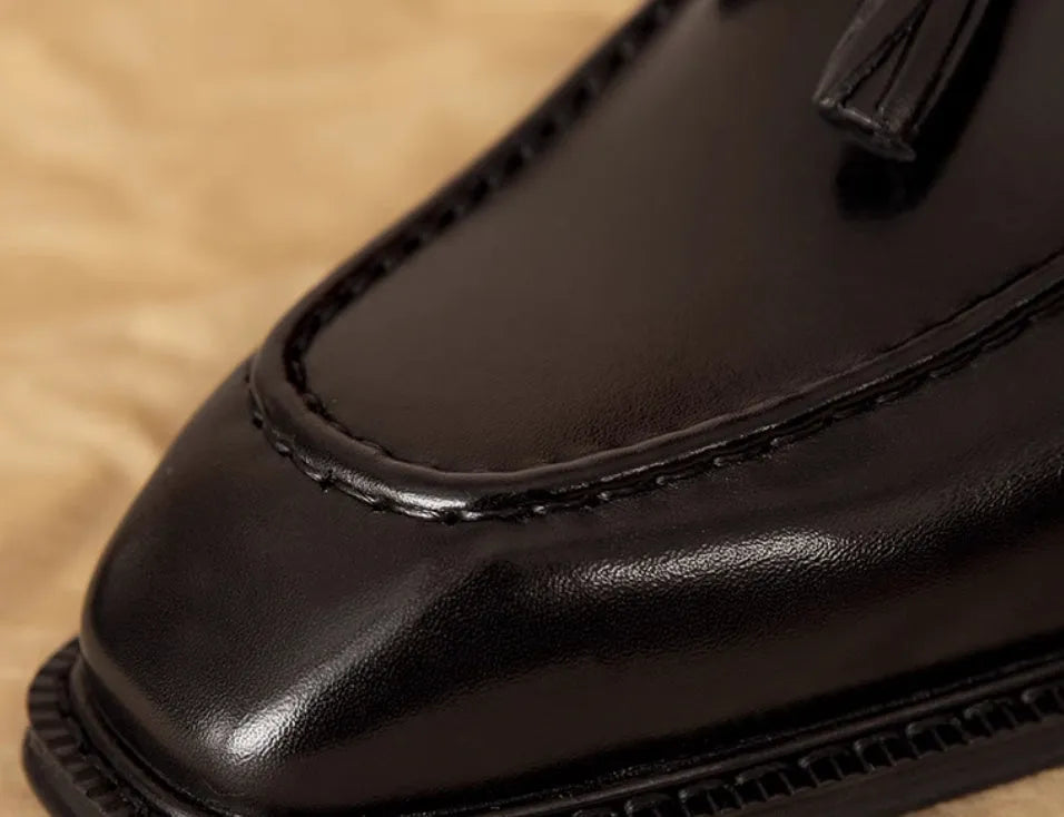 Men's black genuine leather loafers with fringed design and rubber sole