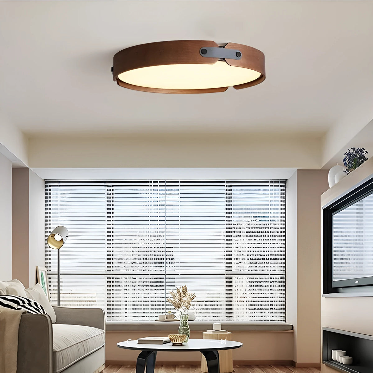 Japanese style wooden ceiling lamp with a PMMA shade in a warm light colour, shown in a bedroom setting.
