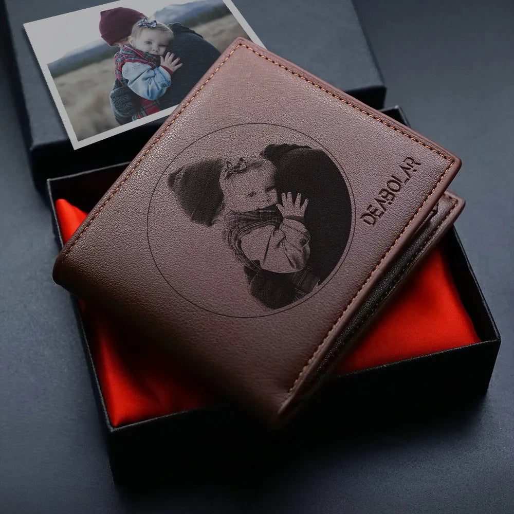 Brown leather men's wallet with a silver zipper closure laid flat.