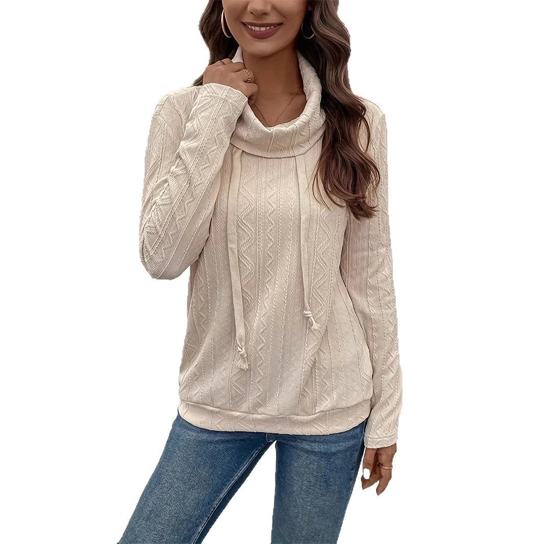 Apricot coloured hooded pullover sweater with long sleeves and drawstring adjustment