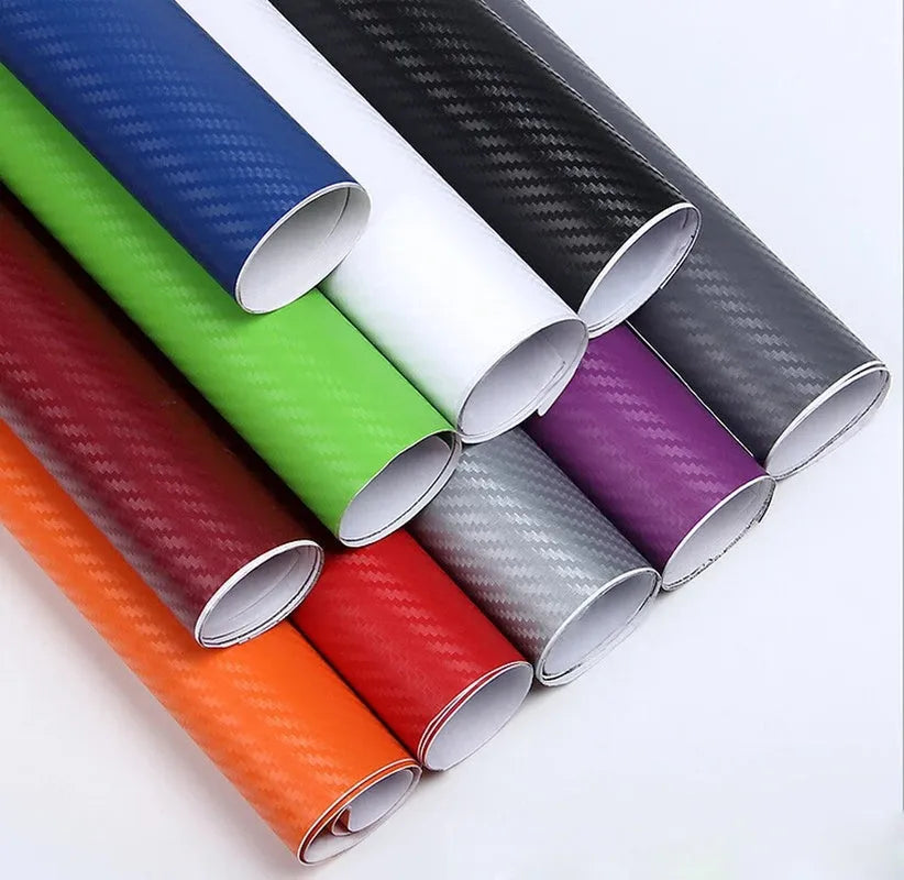 Roll of 3D carbon fibre sticker in assorted colours, showing texture and scale next to a 30cm ruler.