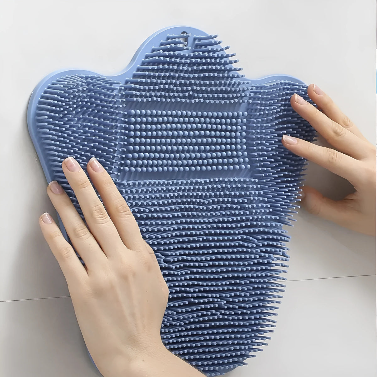 Blue silicone bath massage cushion with removable mat for back washing