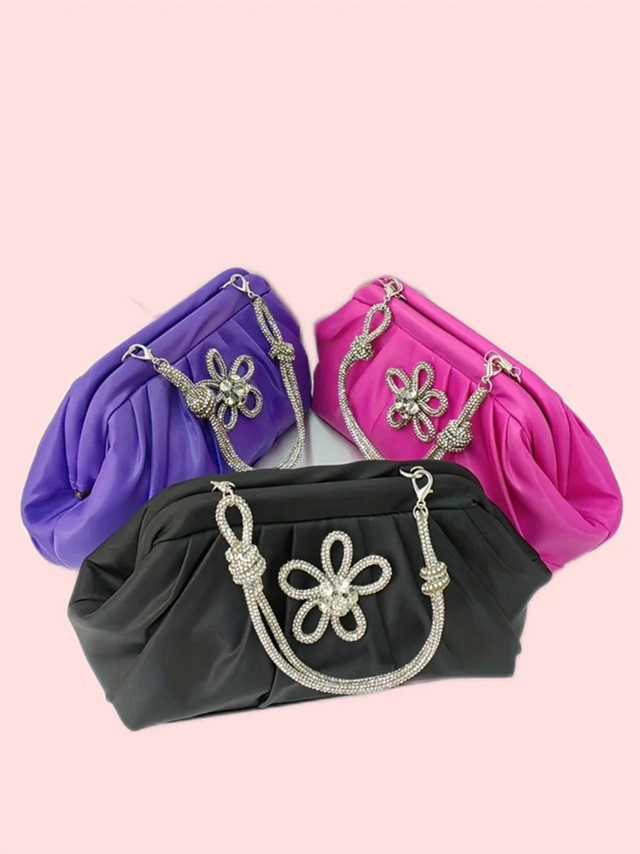Women's soft polyester messenger bag with diamond quilting and chain strap in black colour