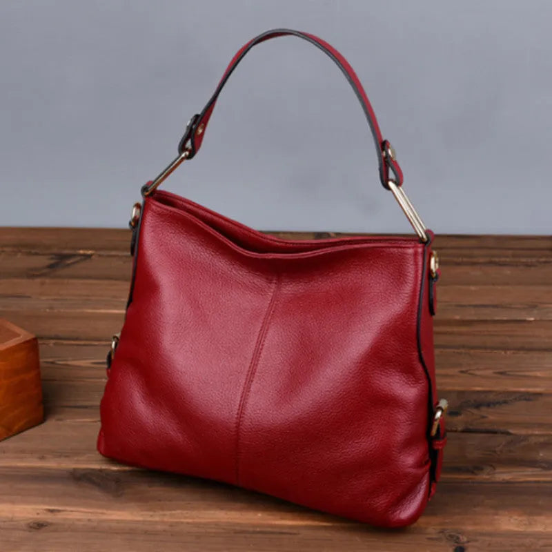Genuine leather crossbody bag in square vertical shape with internal zipper organisers