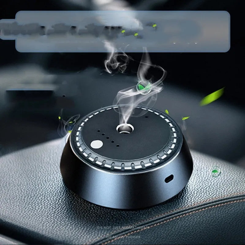 Black metal car aroma diffuser with USB charging port and control buttons