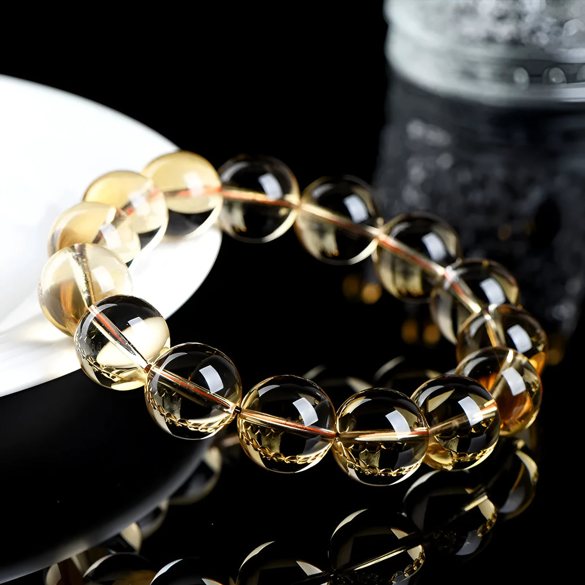 Natural citrine scattered beads ball bracelet showing polished gemstone beads in yellow-amber tones on a wrist.