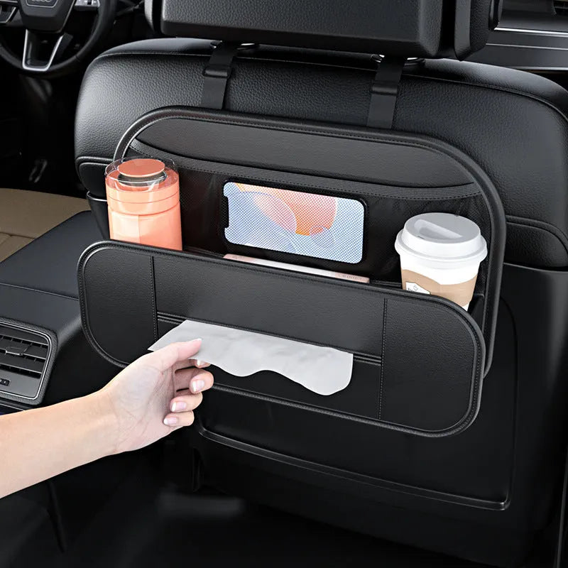 Black leather car seat rear storage bag mounted behind a vehicle seat