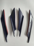 Set of four black carbon fibre pattern ABS plastic air knives for car bumper spoiler installation.