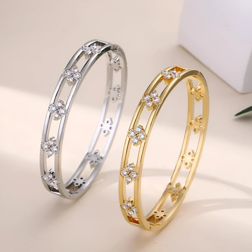 Gold or silver buckle hollow women's bracelet with four-leaf clover charm and zircon detail
