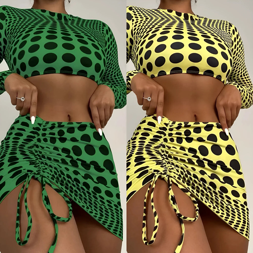 Women's green polka dot swimsuit three-piece set with bra, top and skirt on hanger