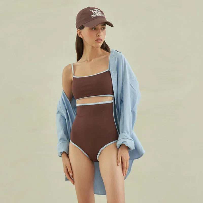 Brown women's one-piece swimsuit with triangle bikini top design and sexy pattern