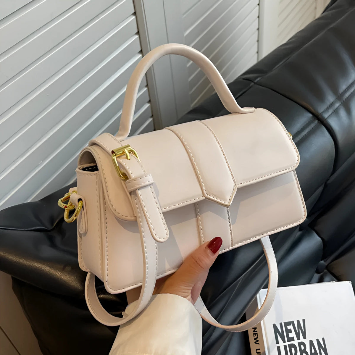 Women's beige PU messenger bag showing front view with sandwich pocket, 22cm width, and handle.