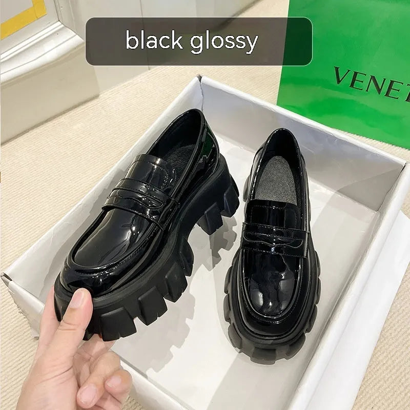 British style wide fit loafers for men and women in patent leather or matte finish with rubber sole.