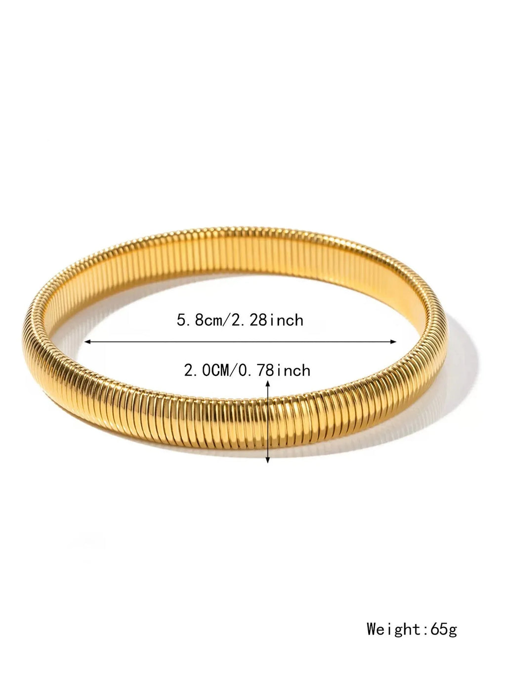 Gold titanium steel women's bracelet with vertical stripes and elastic ring design on a wrist.
