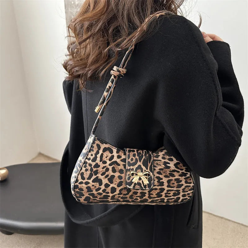 Large casual women's handbag with sandwich pocket design in four colour options