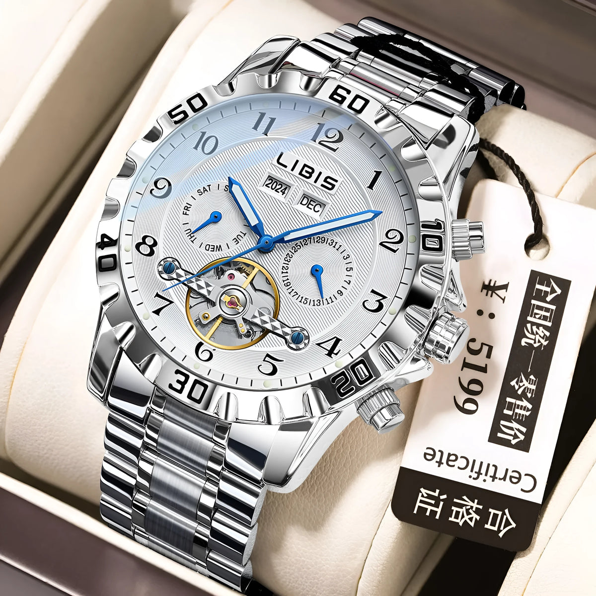 Men's silver automatic perpetual calendar watch with stainless steel strap on wrist.