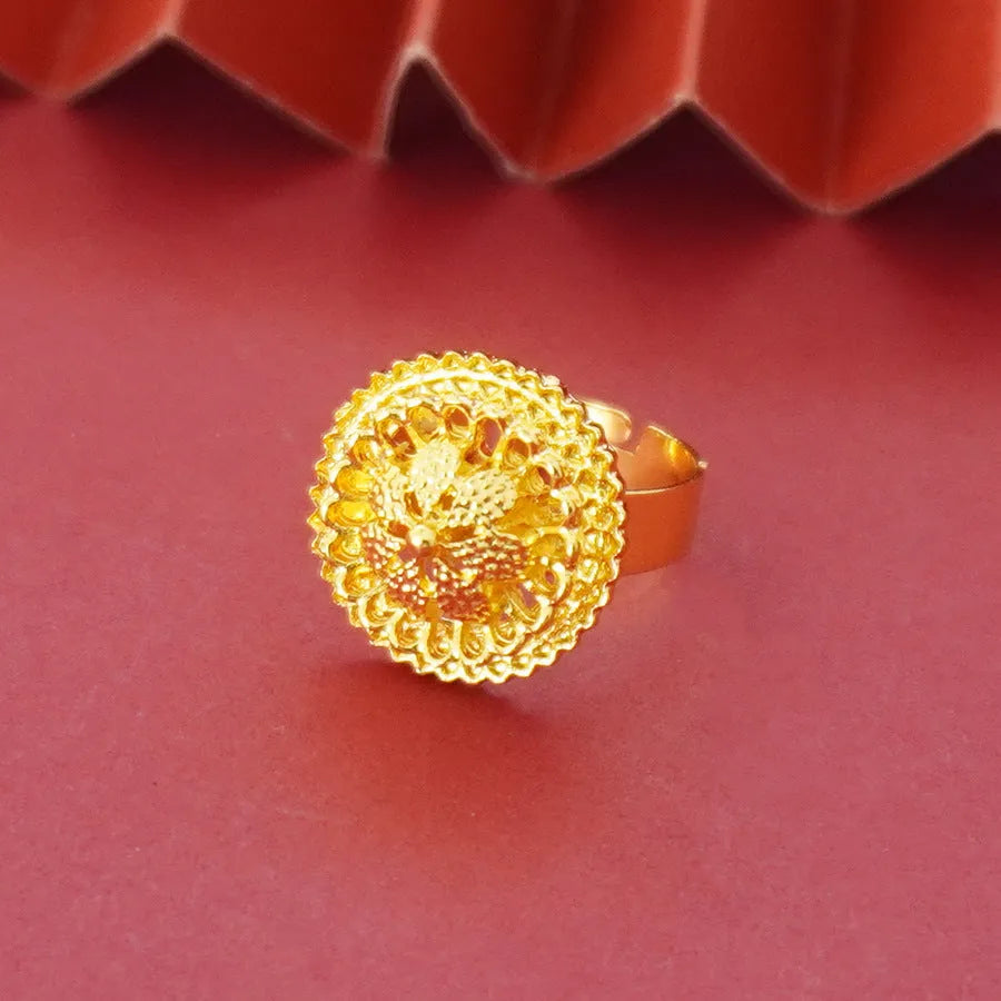 Gold-plated three-piece jewellery set with floral pendant design including necklace, earrings and ring