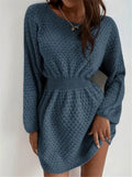 Blue women's knitted sweater dress with hand-crocheted flowers and a fitted waist.