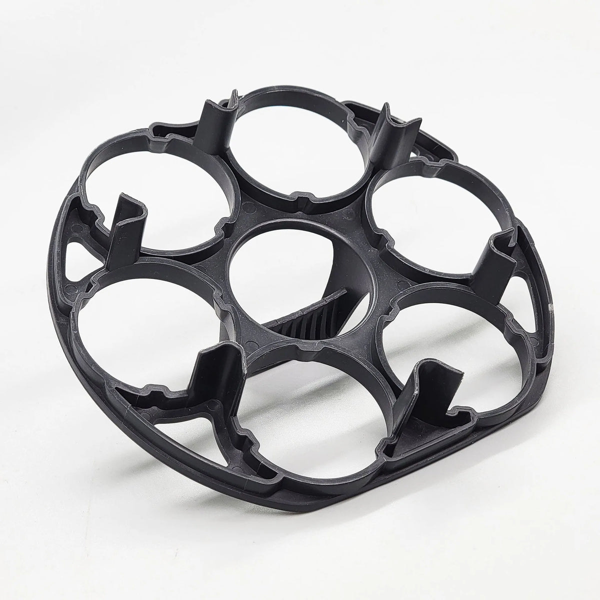 Black modern plastic egg holder rack for cooking machines, dimensions 13.8cm wide by 12.6cm deep.